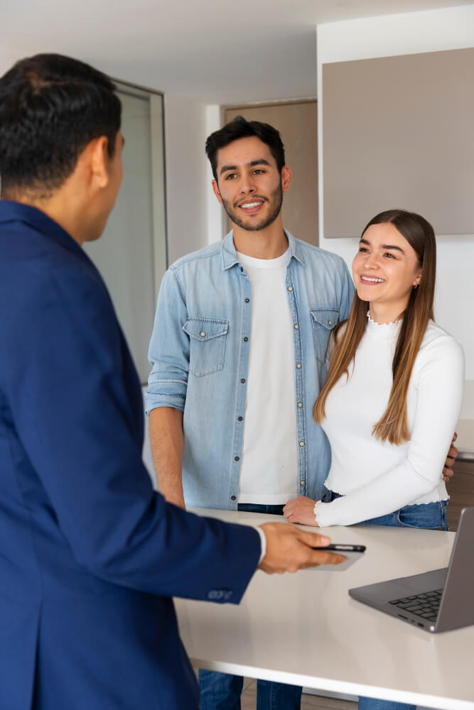 Side view couple talking to real estate agent Side view couple talking to real estate agent